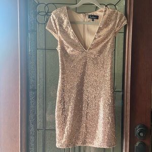 Golden body on sequin dress